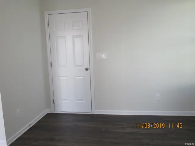 a front view of a house with a garage