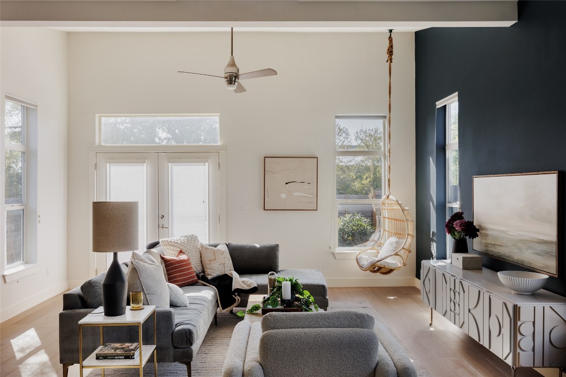 a living room with furniture and a window