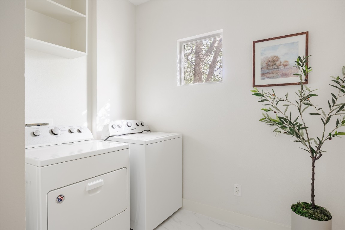 1205 McKinley Avenue Austin, TX 78702 - Photo 15 of 34 a utility room with dryer and washer
