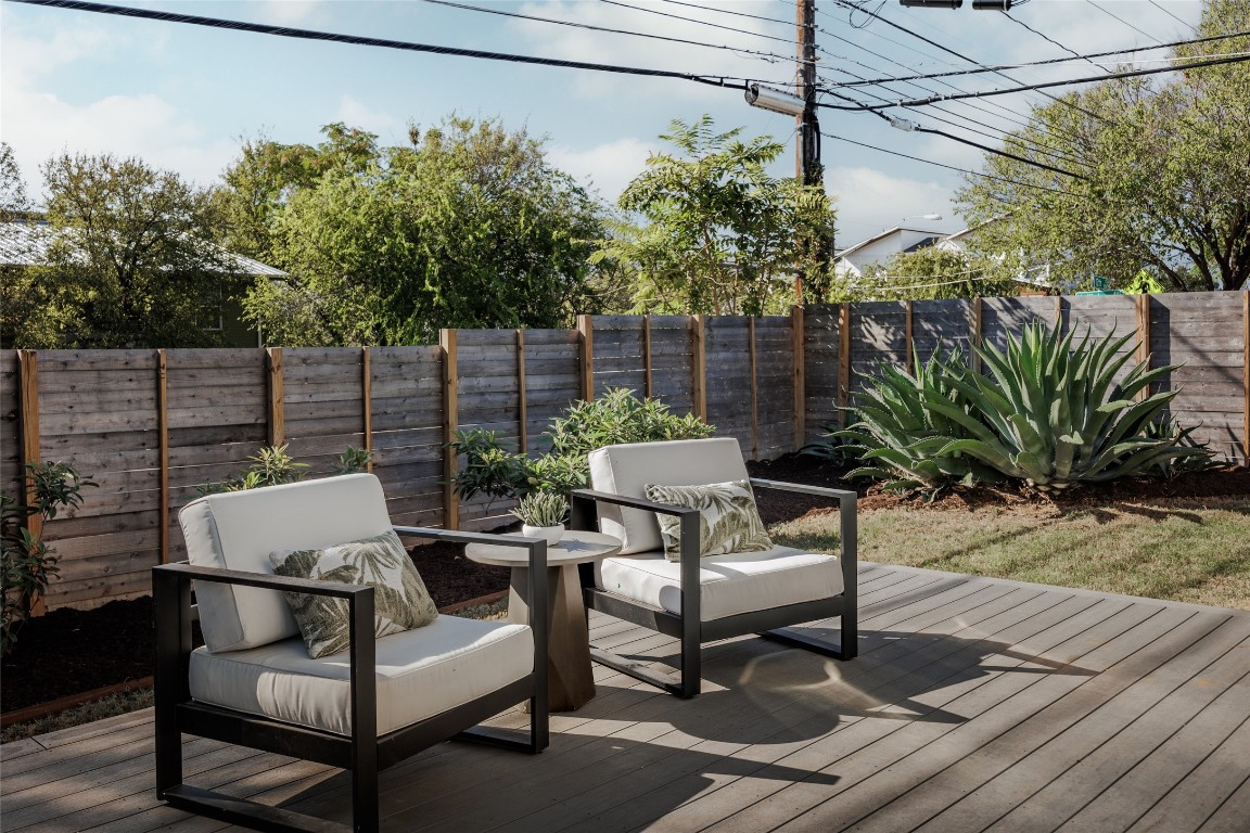 1205 McKinley Avenue Austin, TX 78702 - Photo 29 of 34 a backyard of a house with table and chairs
