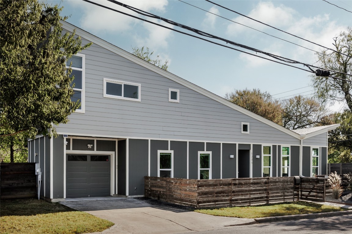 1205 McKinley Avenue Austin, TX 78702 - Photo 3 of 34 a front view of a house with a yard