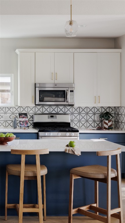 1205 McKinley Avenue Austin, TX 78702 - Photo 33 of 34 a kitchen with a sink cabinets and appliances