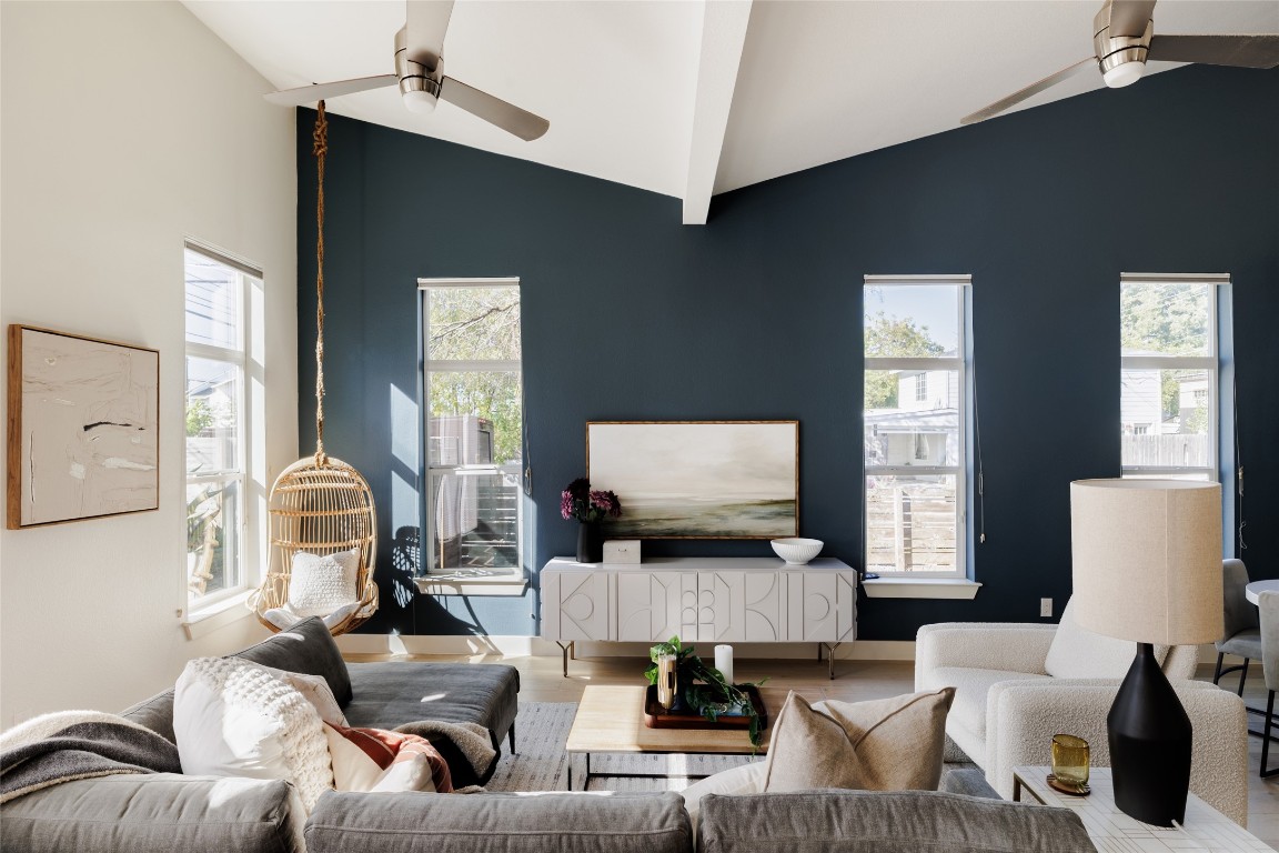 1205 McKinley Avenue Austin, TX 78702 - Photo 7 of 34 a living room with furniture and a flat screen tv