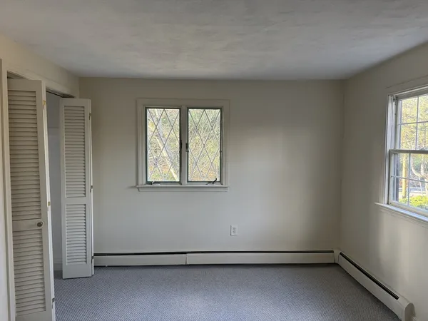 an empty room with windows