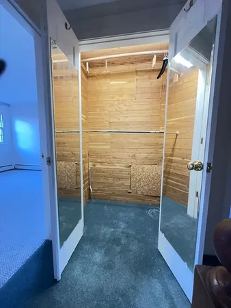 a bathroom with a glass door shower