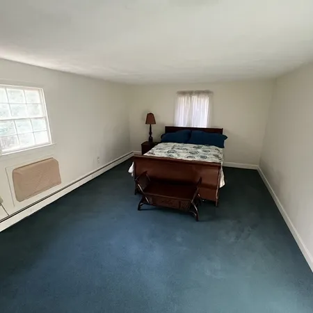 a room with furniture and window