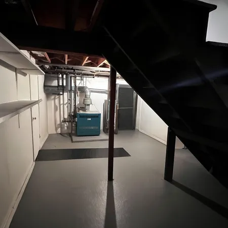 a view of staircase with a rug