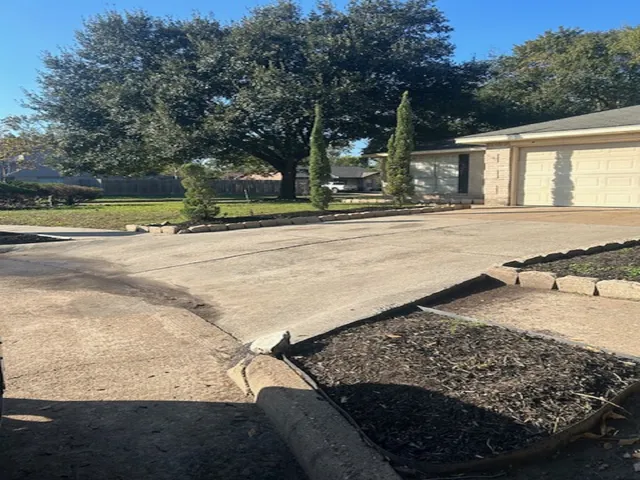 a view of a backyard of the house