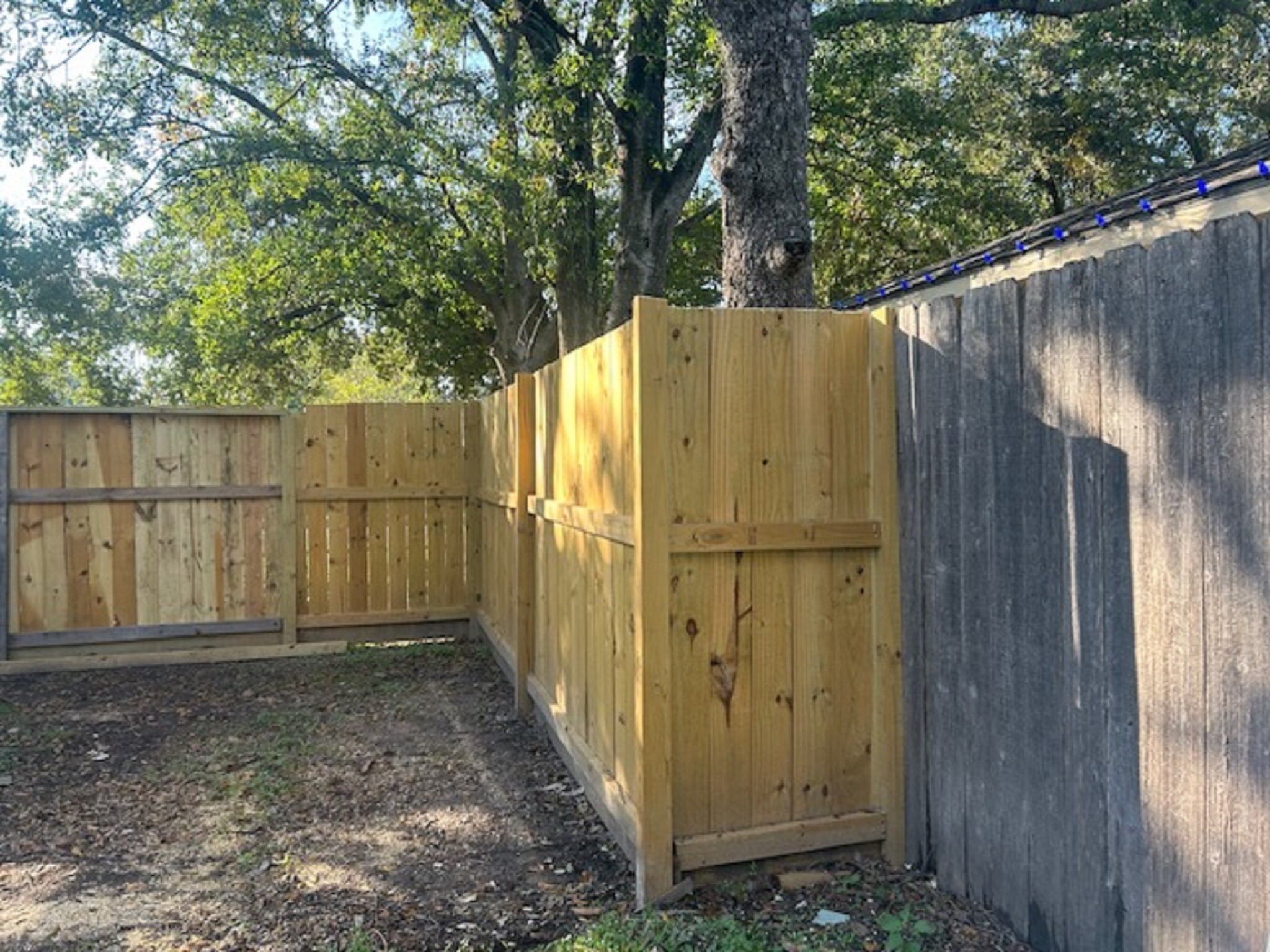 9810 Fernstone Lane Houston, TX 77070 - Photo 3 of 14 a view of a wooden fence