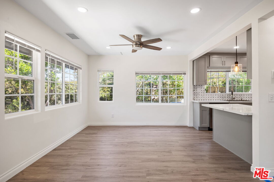 1342 Mohawk Street Los Angeles, CA 90026 - Photo 11 of 29 a view of an empty room with a window and wooden floor