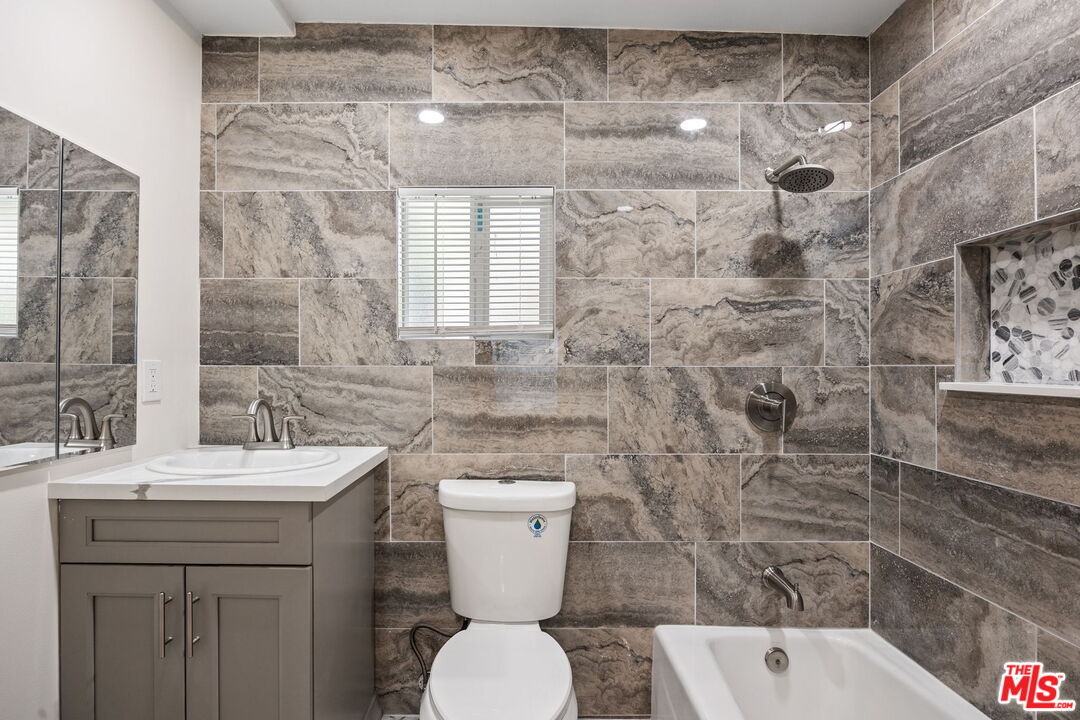 1342 Mohawk Street Los Angeles, CA 90026 - Photo 21 of 29 a bathroom with a sink toilet and shower