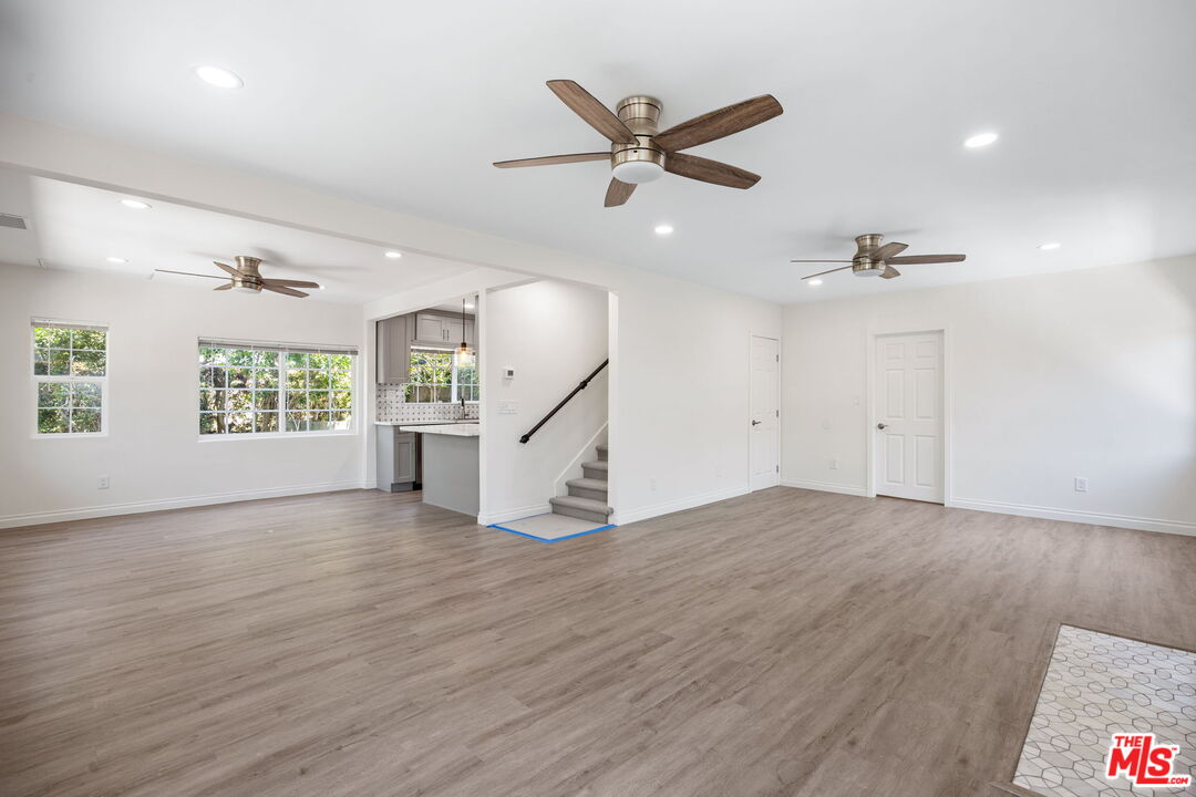 1342 Mohawk Street Los Angeles, CA 90026 - Photo 6 of 29 wooden floor in an empty room with a window
