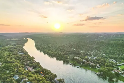 a view of a bench in front of a wall