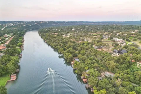 a view of a lake with a city