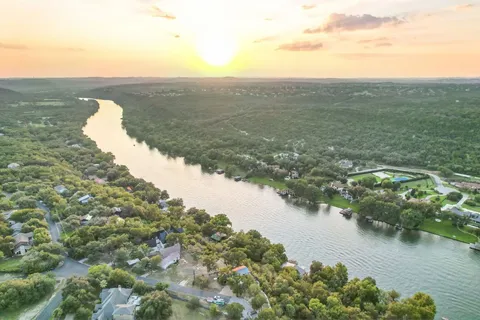 a front view of house and yard with green space