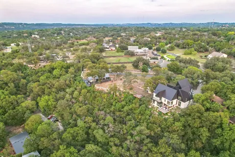 a view of a lake with a yard