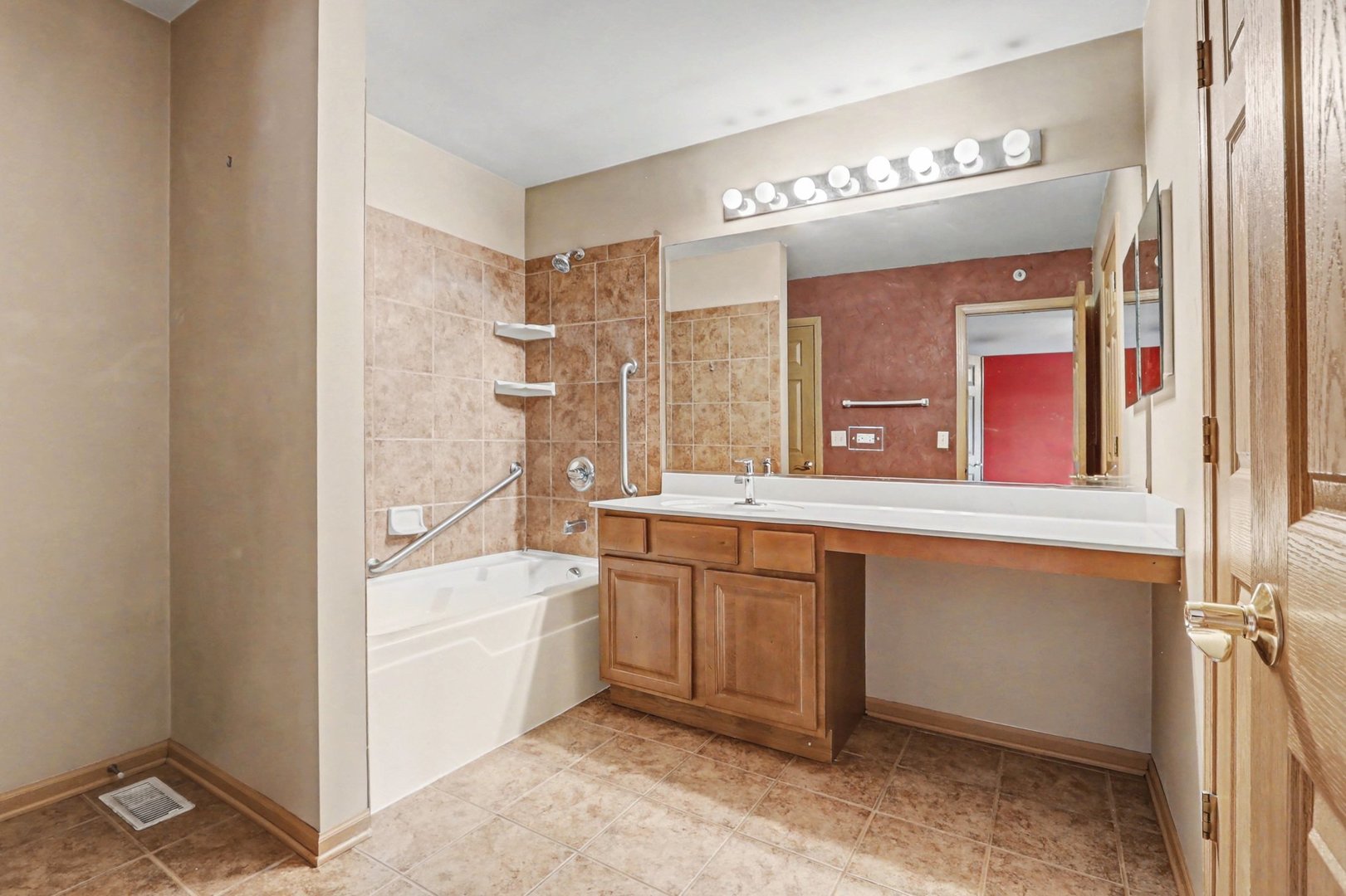 6503 Blue Sky Lane Matteson, IL 60443 - Photo 20 of 23 a spacious bathroom with a double vanity sink a mirror and a bathtub