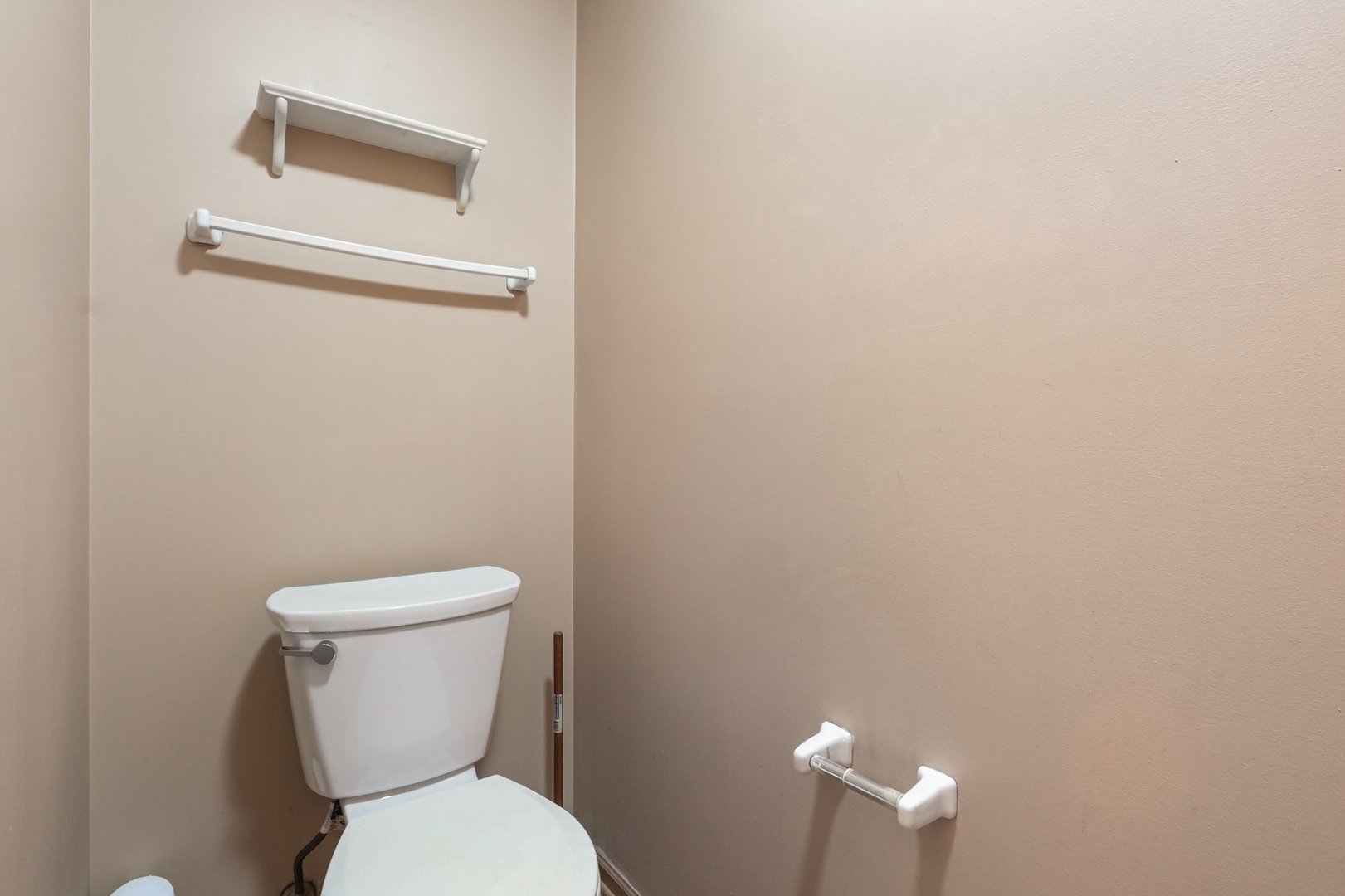 6503 Blue Sky Lane Matteson, IL 60443 - Photo 21 of 23 a white toilet sitting next to a white wall