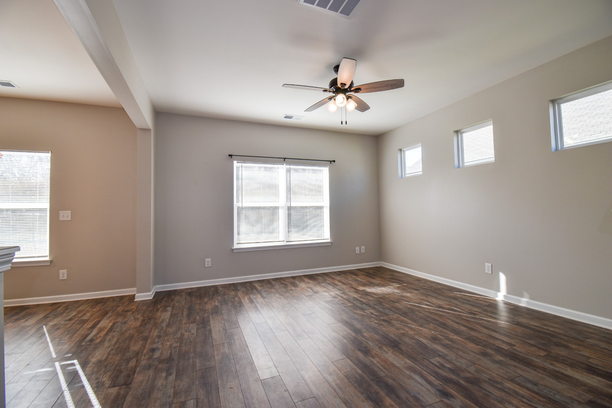 525 Burchell Lane Columbia, TN 38401 - Photo 15 of 29 a view of an empty room with wooden floor and a window