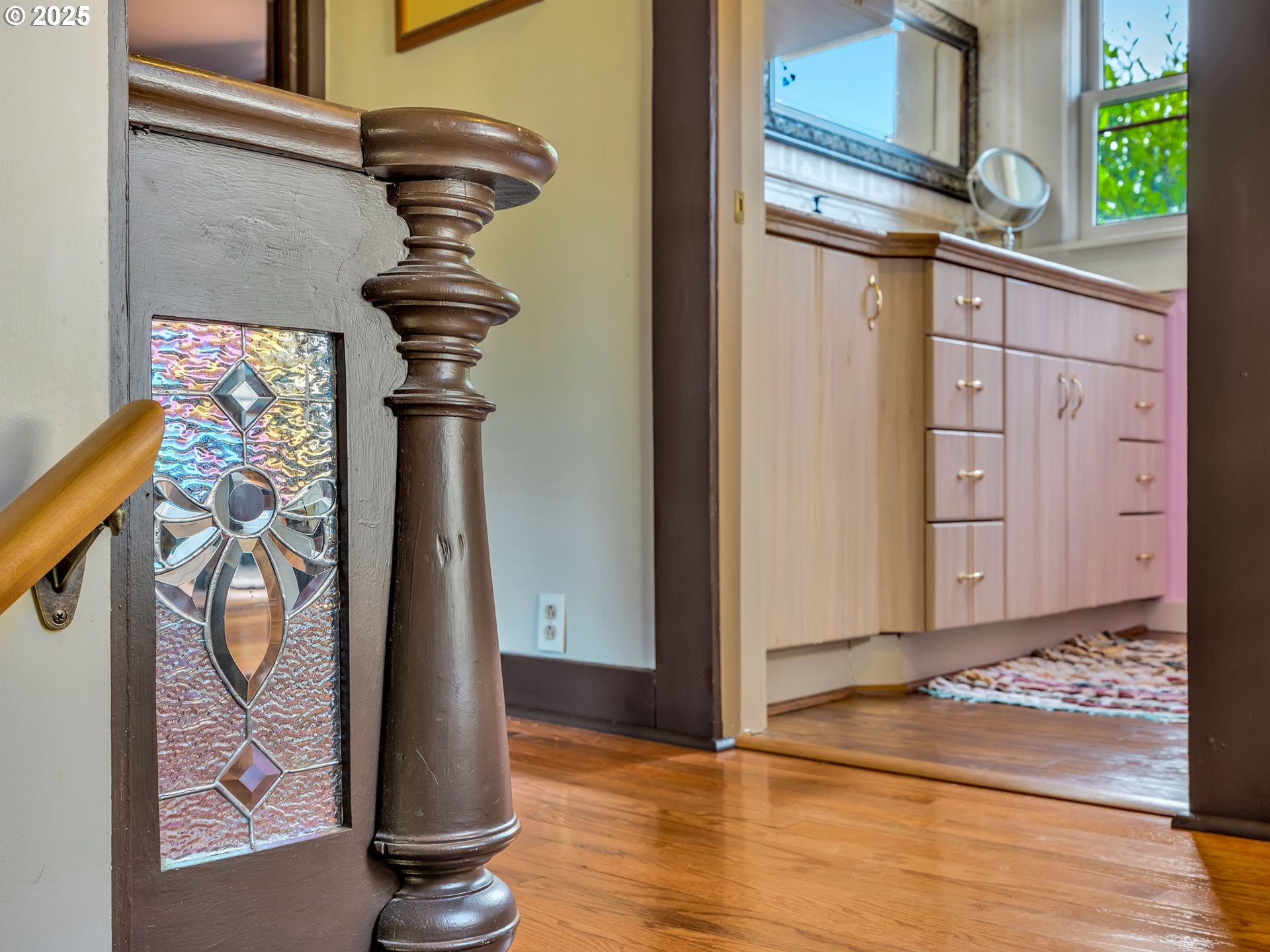 143 Washington Street Astoria, OR 97103 - Photo 28 of 45 a view of a hallway with wooden floor