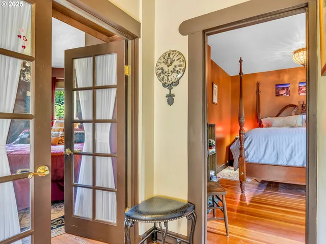 a bathroom with a granite countertop sink and a window