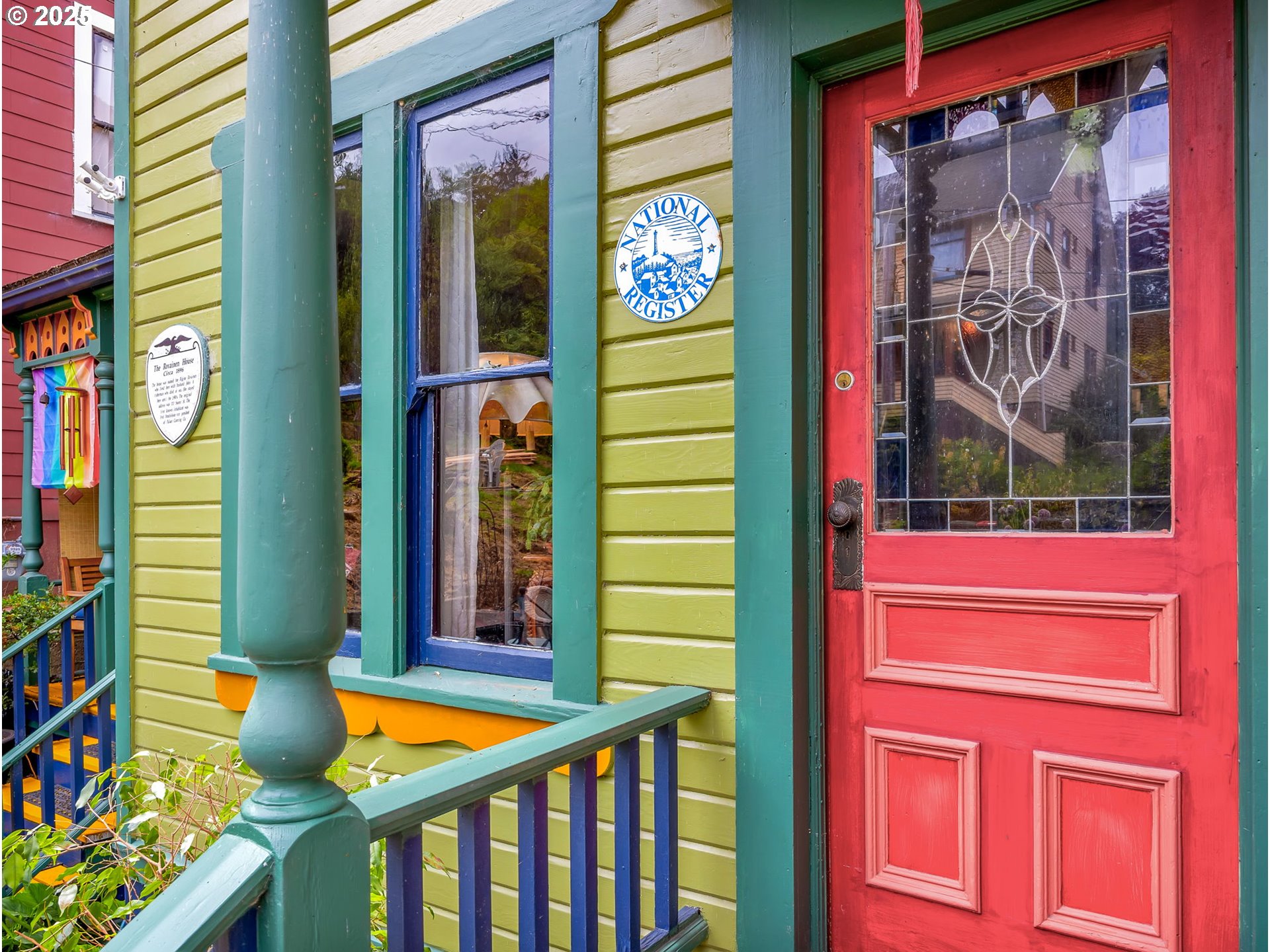 143 Washington Street Astoria, OR 97103 - Photo 3 of 45 a front view of a house with a porch