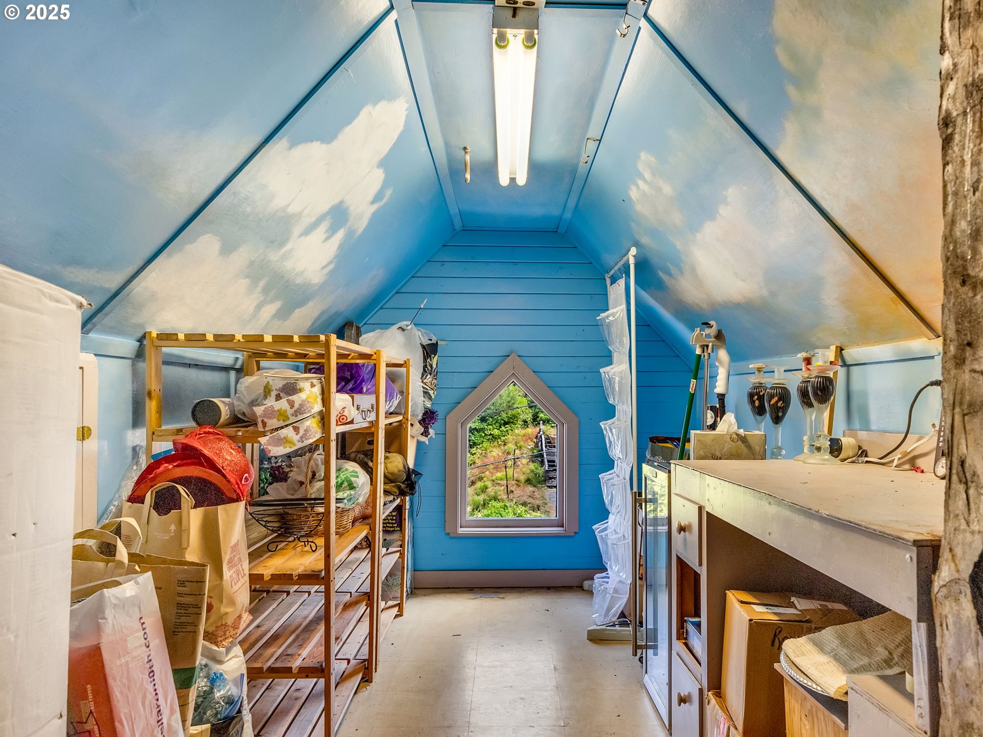 143 Washington Street Astoria, OR 97103 - Photo 39 of 45 a view of utility room with two chairs and a table