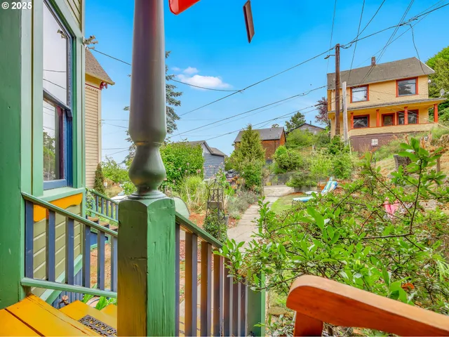 a view of a house with a street