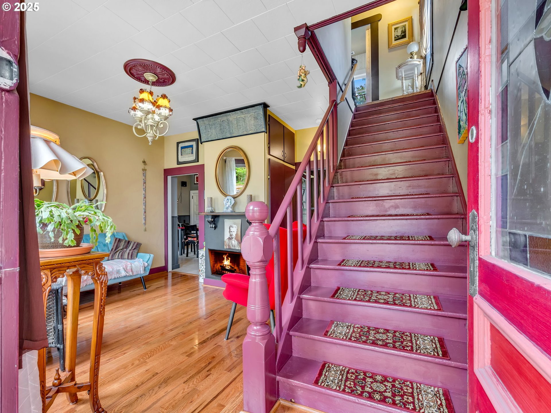 143 Washington Street Astoria, OR 97103 - Photo 6 of 45 a view of entryway with stairs and wooden floor