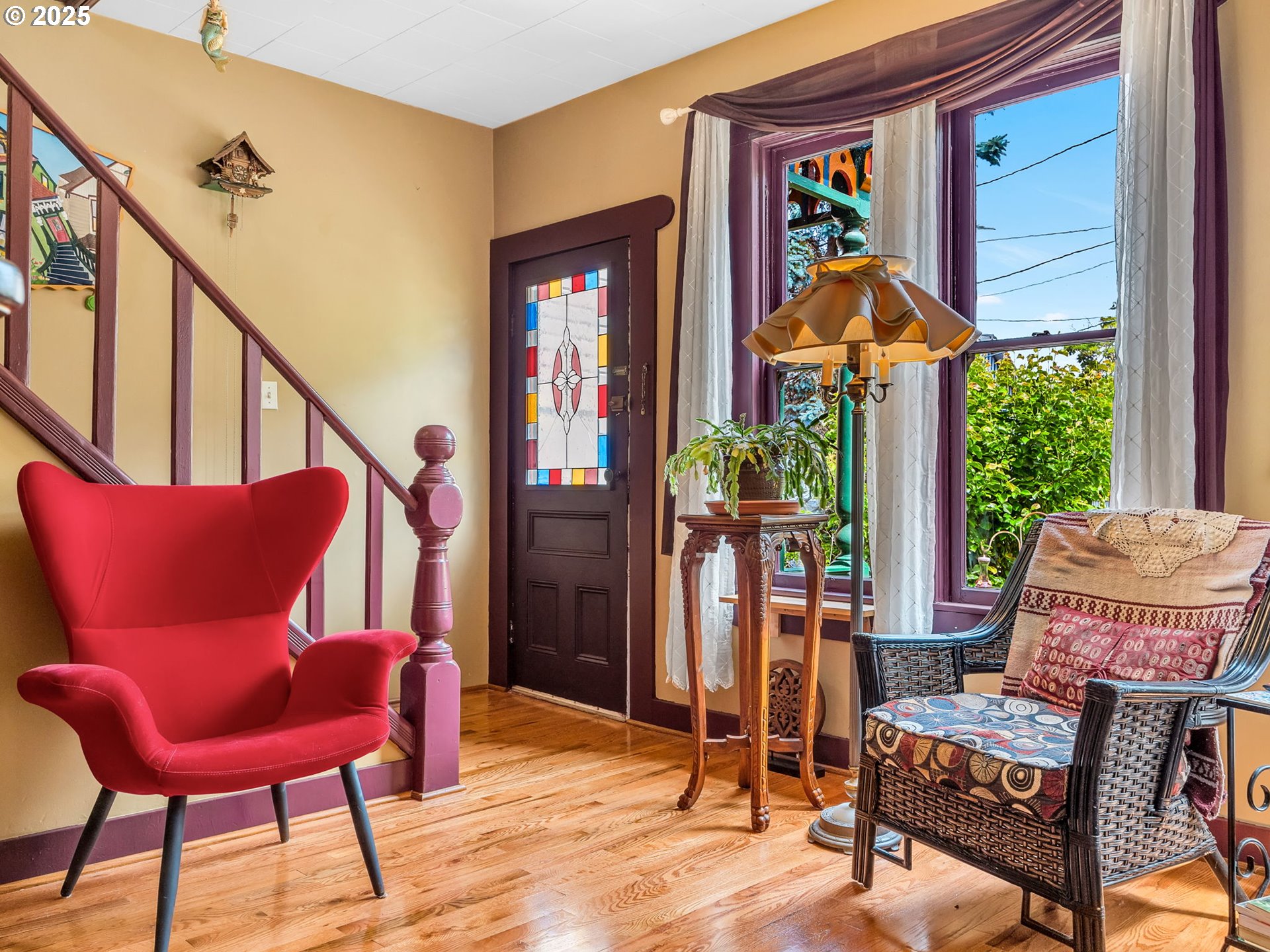 143 Washington Street Astoria, OR 97103 - Photo 7 of 45 a living room with furniture and a window