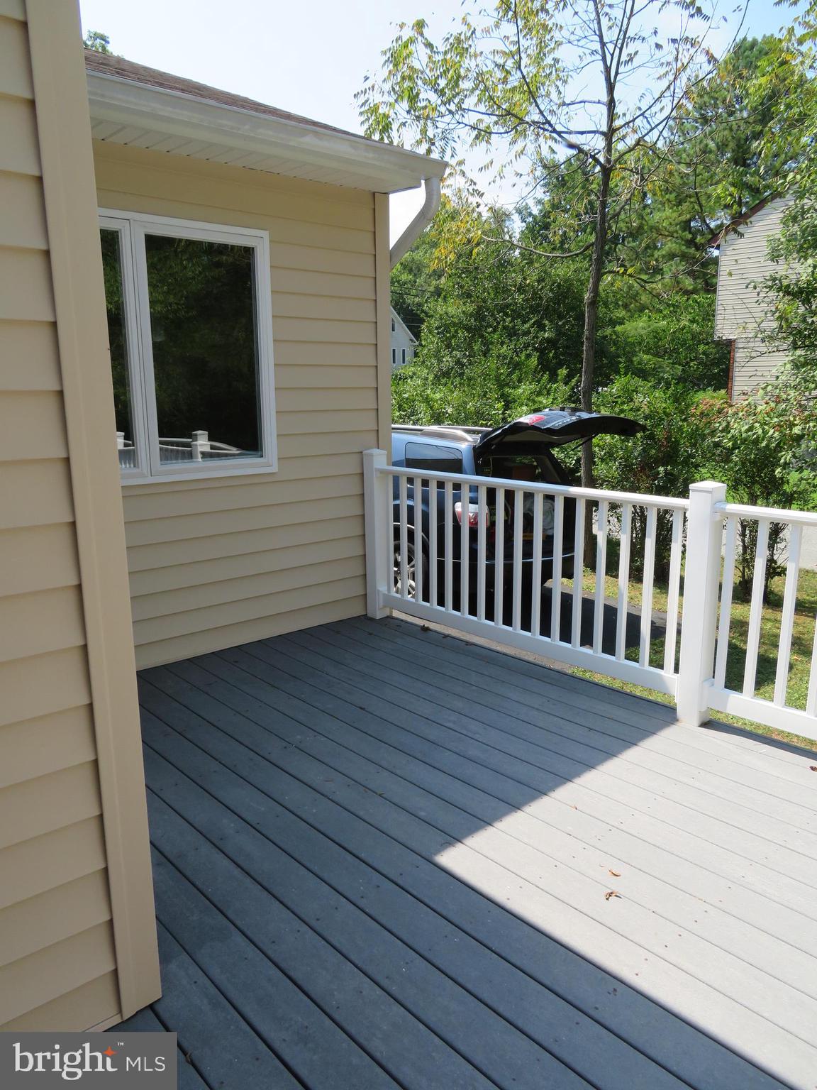 1660 Cape May Road Baltimore, MD 21221 - Photo 34 of 42 Trex deck off the kitchen/family room