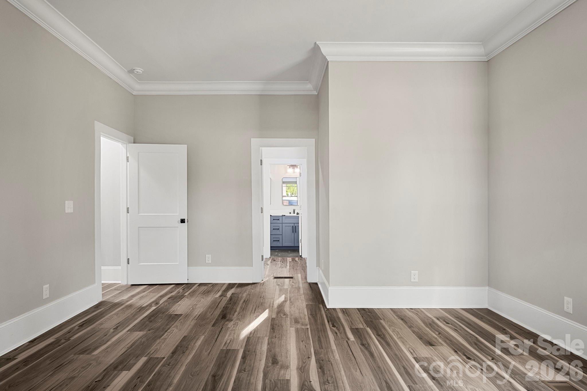 918 North New Hope Road Gastonia, NC 28054 - Photo 23 of 37 a view of a room with wooden floor and bathroom