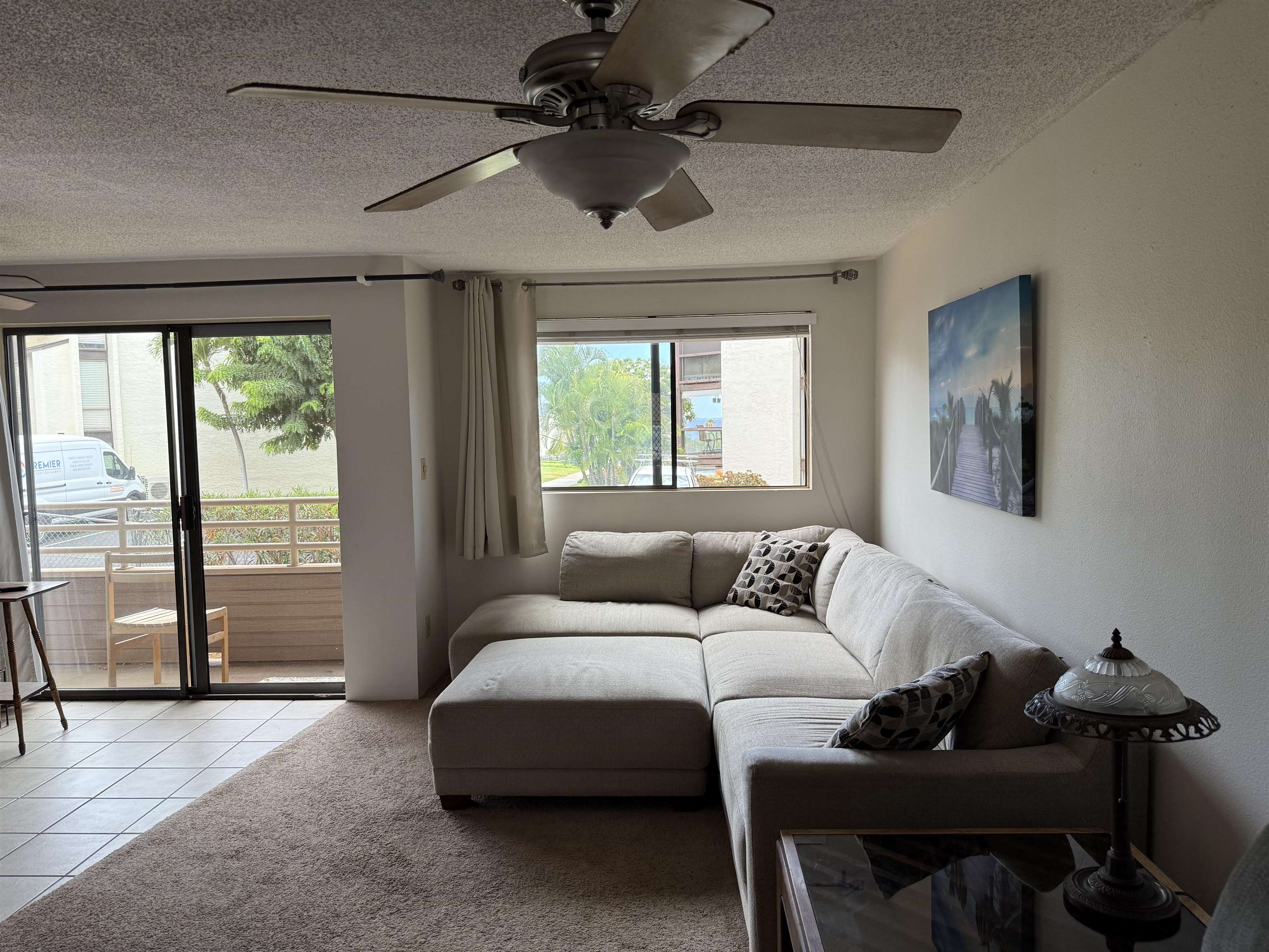2747 South Kihei Road, Unit A101 Kihei, HI 96753 - Photo 4 of 14 a living room with furniture and a window