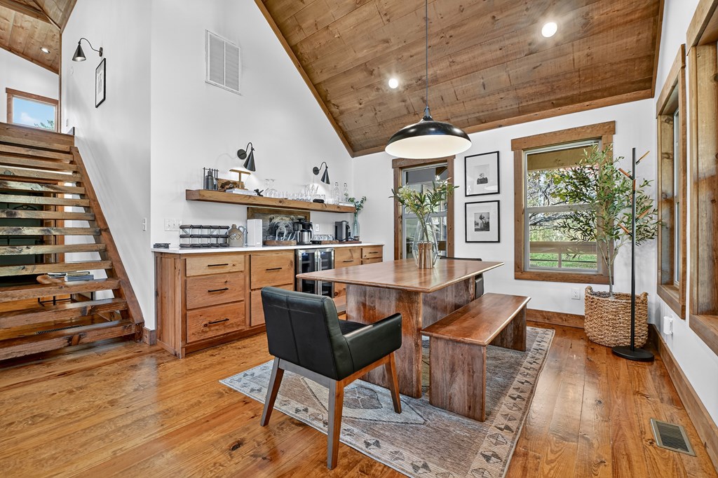 89 High Mdws Drive Morganton, GA 30560 - Photo 22 of 63 a view of a livingroom with furniture wooden floor and windows