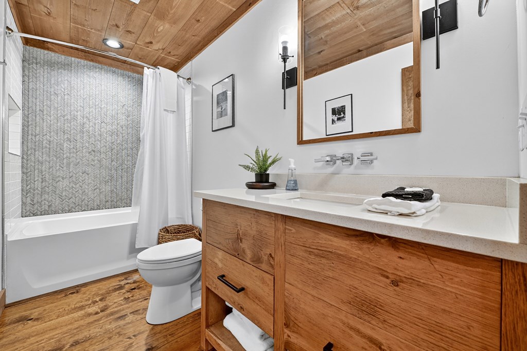 89 High Mdws Drive Morganton, GA 30560 - Photo 35 of 63 a bathroom with a sink toilet and shower