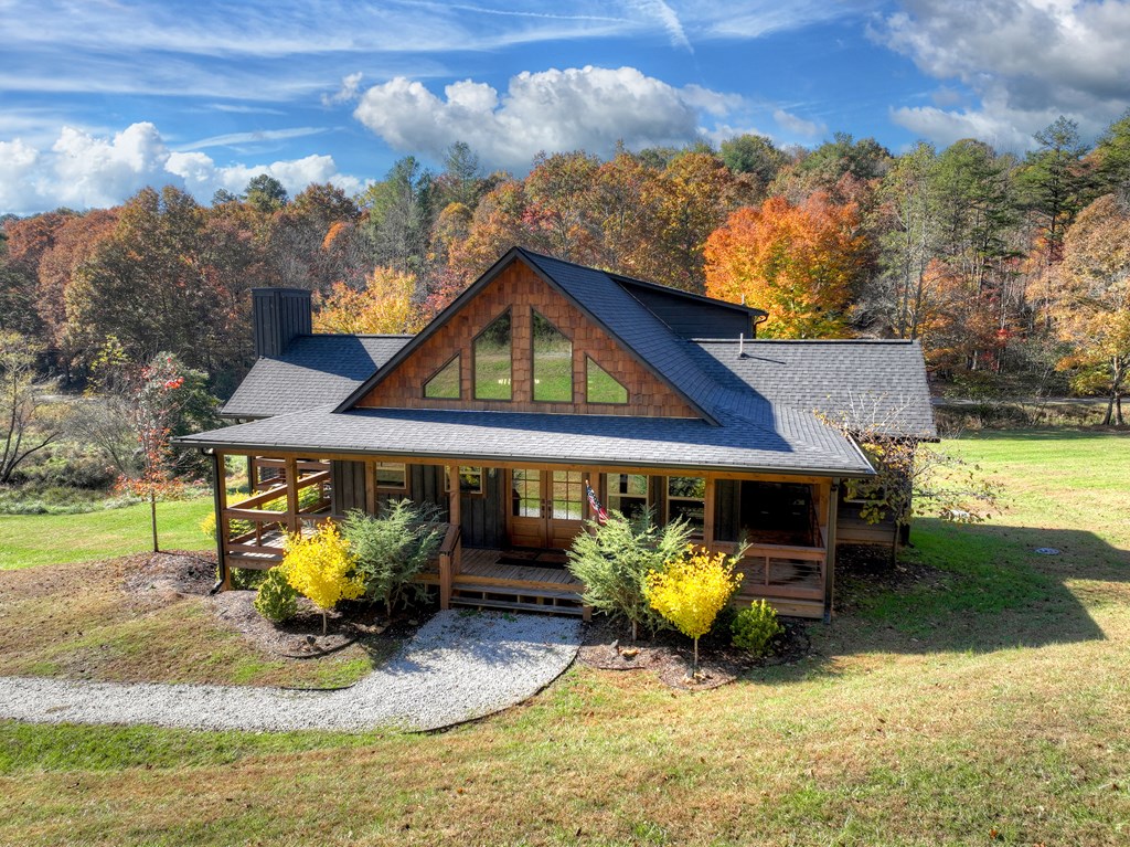 89 High Mdws Drive Morganton, GA 30560 - Photo 4 of 63 a view of a house with backyard porch and sitting area