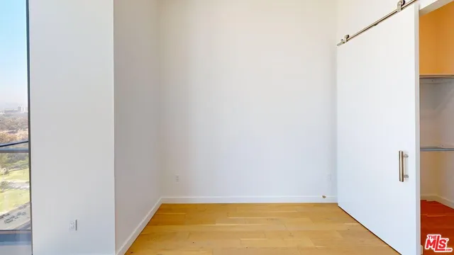 a view of bathroom with bathtub and window