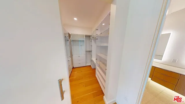a bathroom with a tub and shower