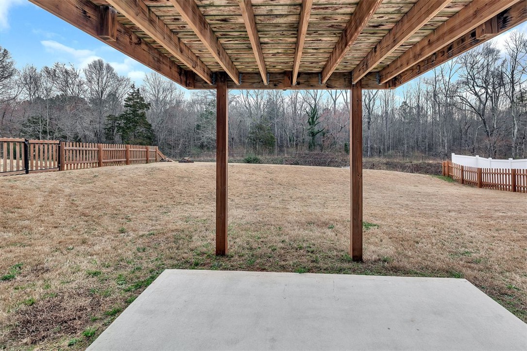 150 Queens Mill Court Pendleton, SC 29670 - Photo 30 of 37 This spacious backyard with mature trees offers a private retreat for outdoor enjoyment.