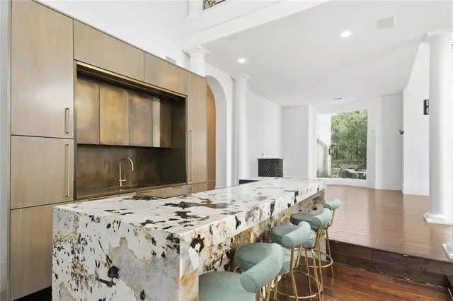 a bedroom with a bed and a fireplace