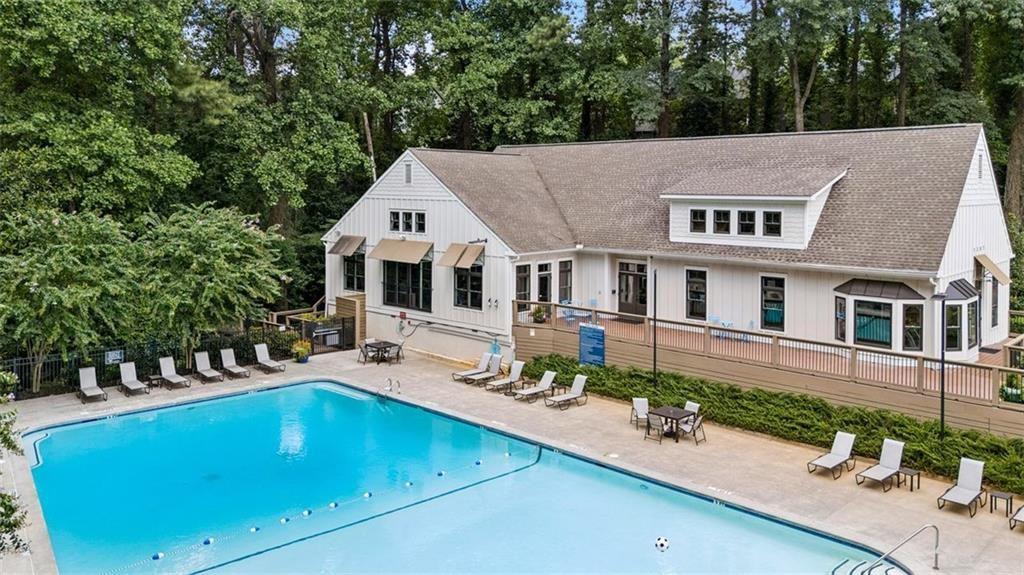 2090 Emmet Park Lane, Unit 425 Decatur, GA 30033 - Photo 71 of 102 an aerial view of a house with swimming pool and porch