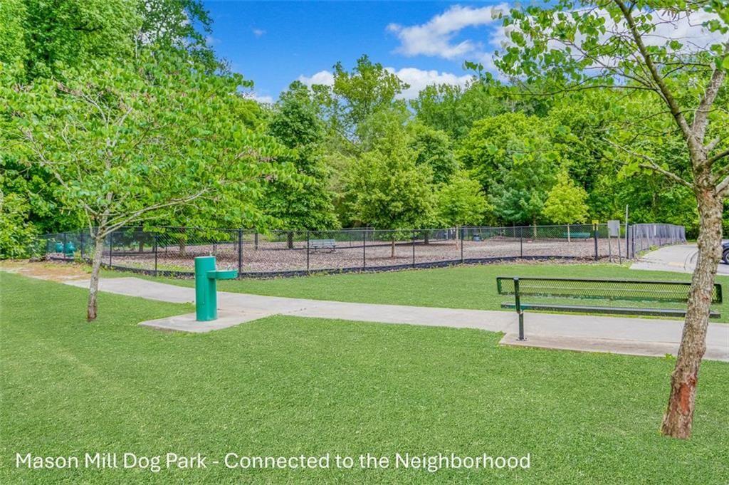 2090 Emmet Park Lane, Unit 425 Decatur, GA 30033 - Photo 81 of 102 a view of a park with swings