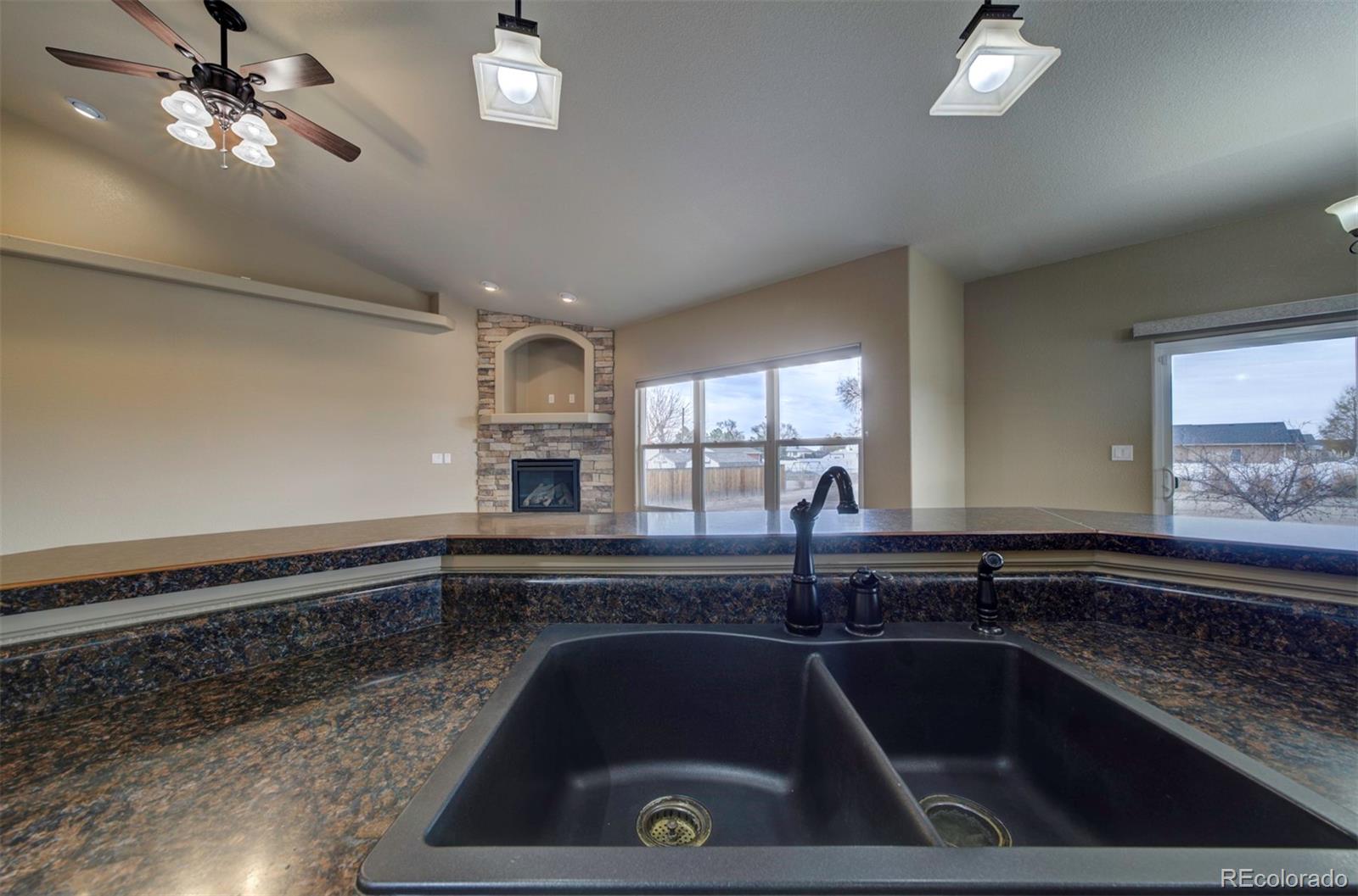 24484 Gale Road Pueblo, CO 81006 - Photo 16 of 43 a kitchen that has a sink and cabinets