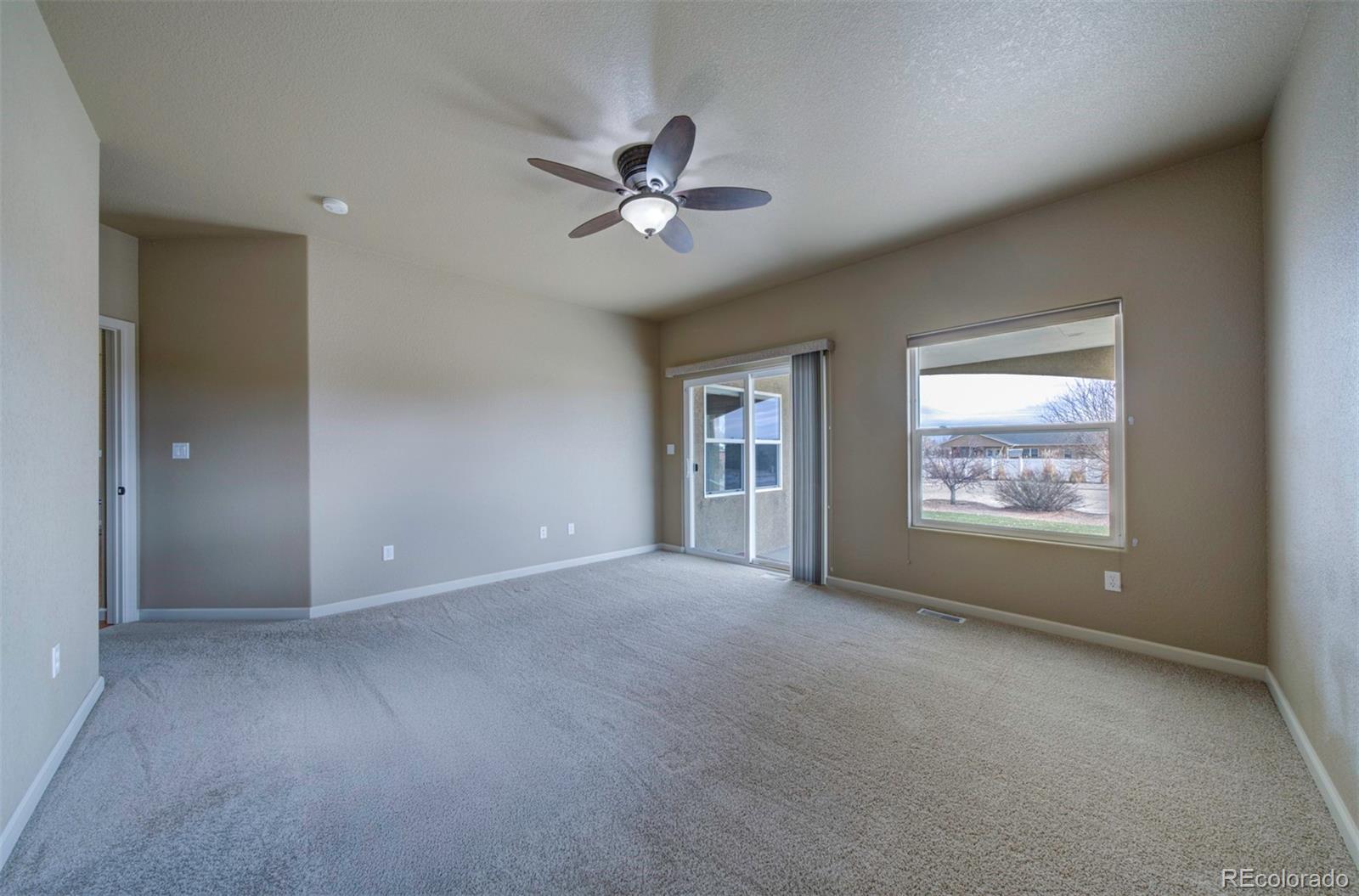 24484 Gale Road Pueblo, CO 81006 - Photo 24 of 43 a view of an empty room with a window