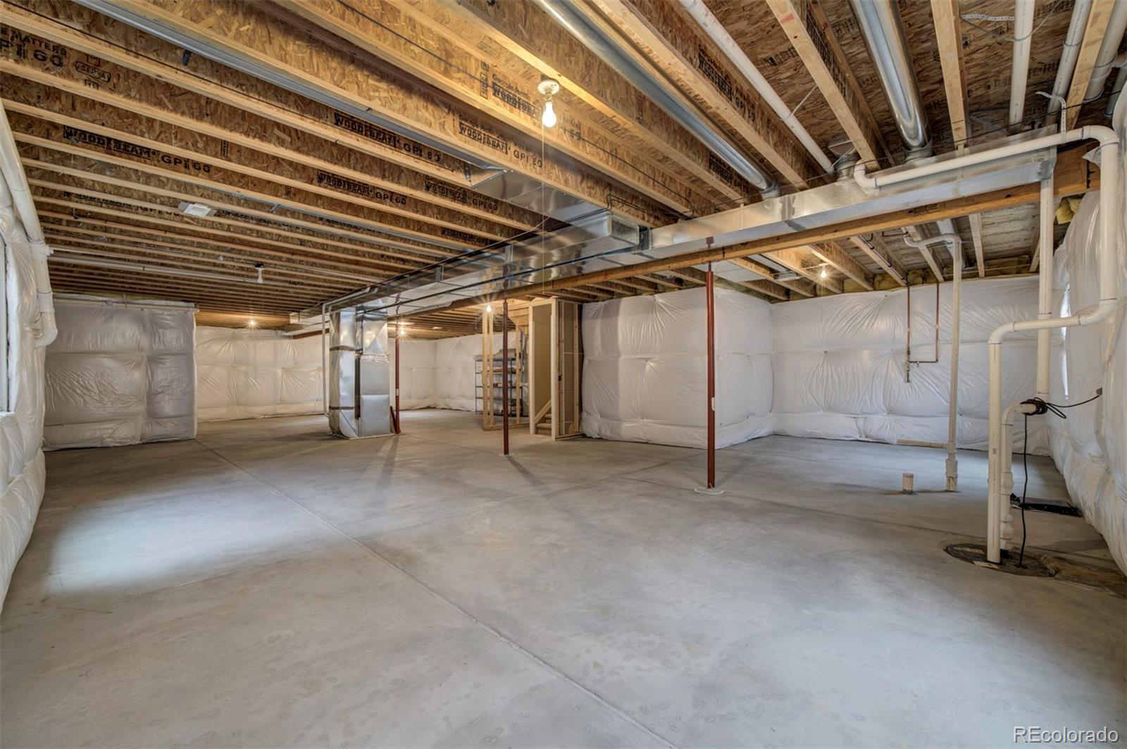 24484 Gale Road Pueblo, CO 81006 - Photo 36 of 43 a view of empty room with wooden ceiling