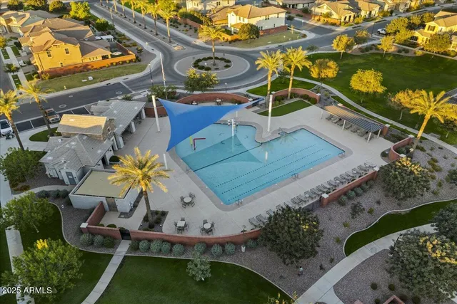 a kitchen with a refrigerator and a sink