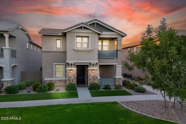 an aerial view of a house with outdoor space