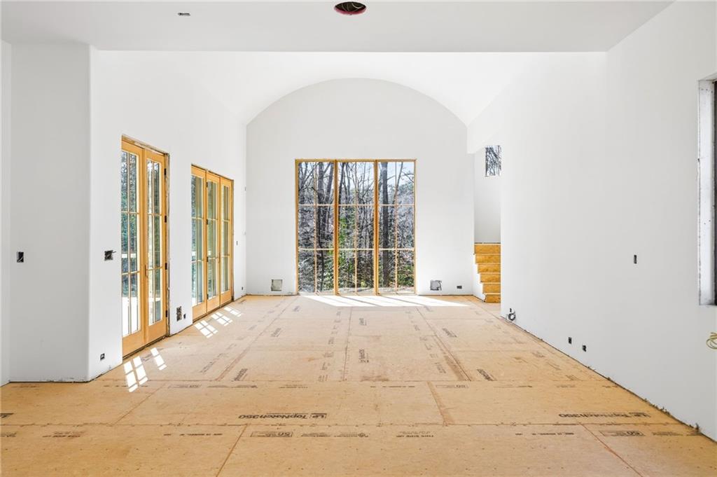 312 Blackland Road Northwest Atlanta, GA 30342 - Photo 12 of 58 a view of an empty room with a window