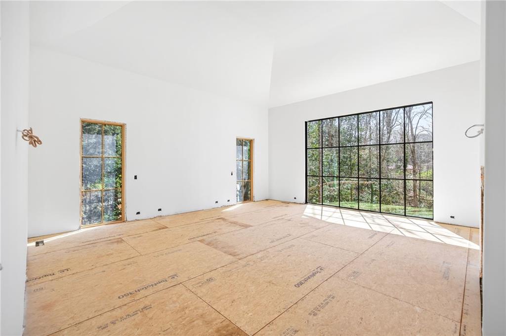 312 Blackland Road Northwest Atlanta, GA 30342 - Photo 23 of 58 a view of an empty room with a window