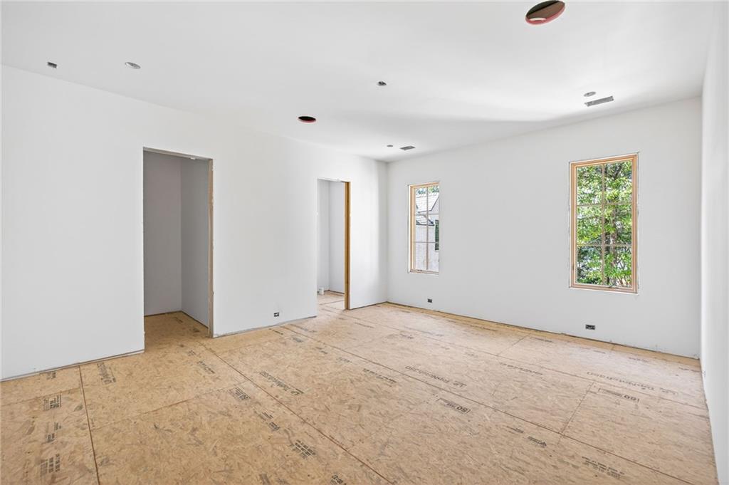 312 Blackland Road Northwest Atlanta, GA 30342 - Photo 31 of 58 a view of an empty room with a window